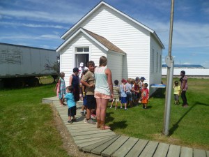 Ringing the Big Bell at the School House